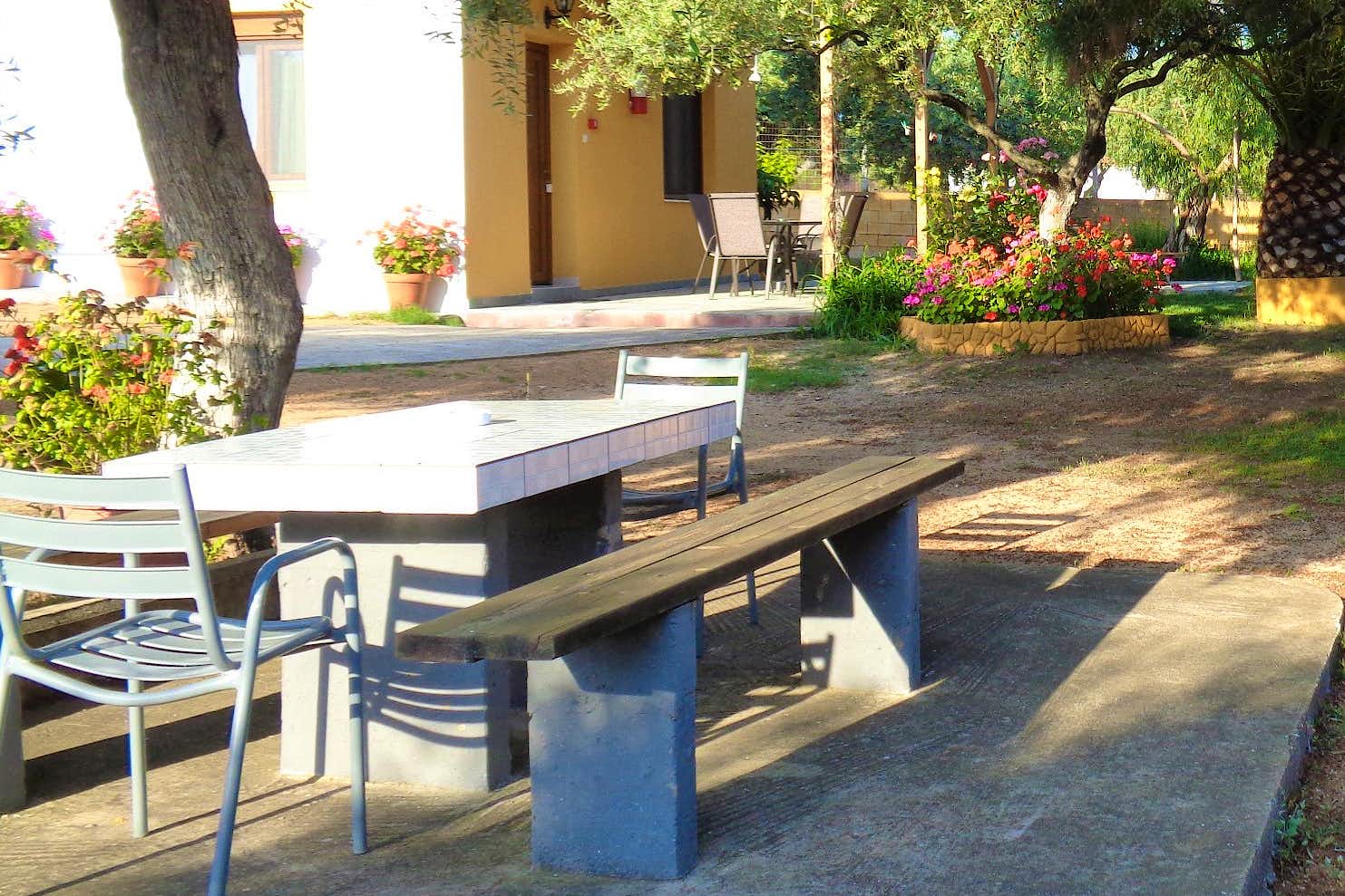 Photo Caption: 3 Picnic Tables Eat, drink, and play Gather around