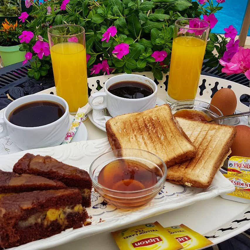 Photo Caption: Start your morning right with a delicious poolside breakfast
