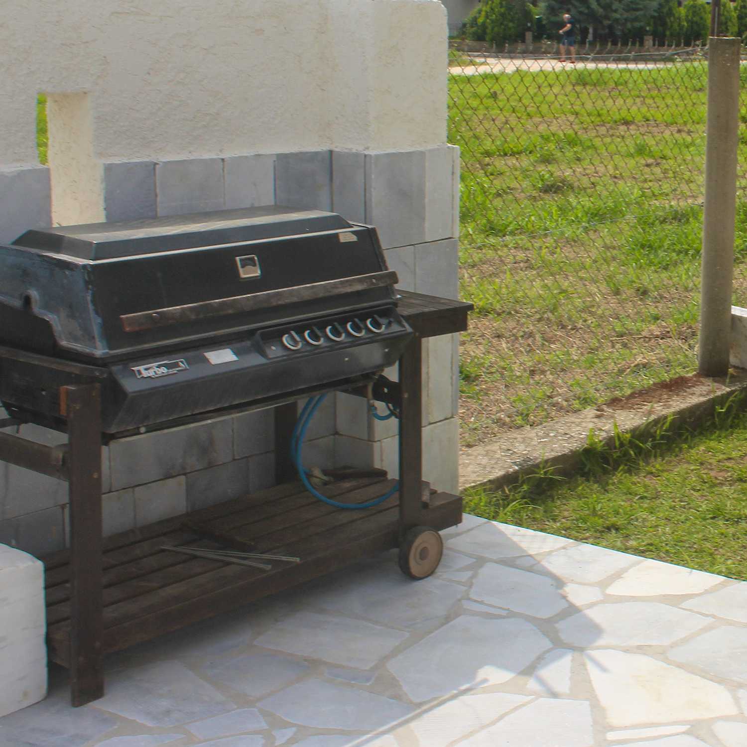 Photo Caption: Have a BBQ with our grill in the garden