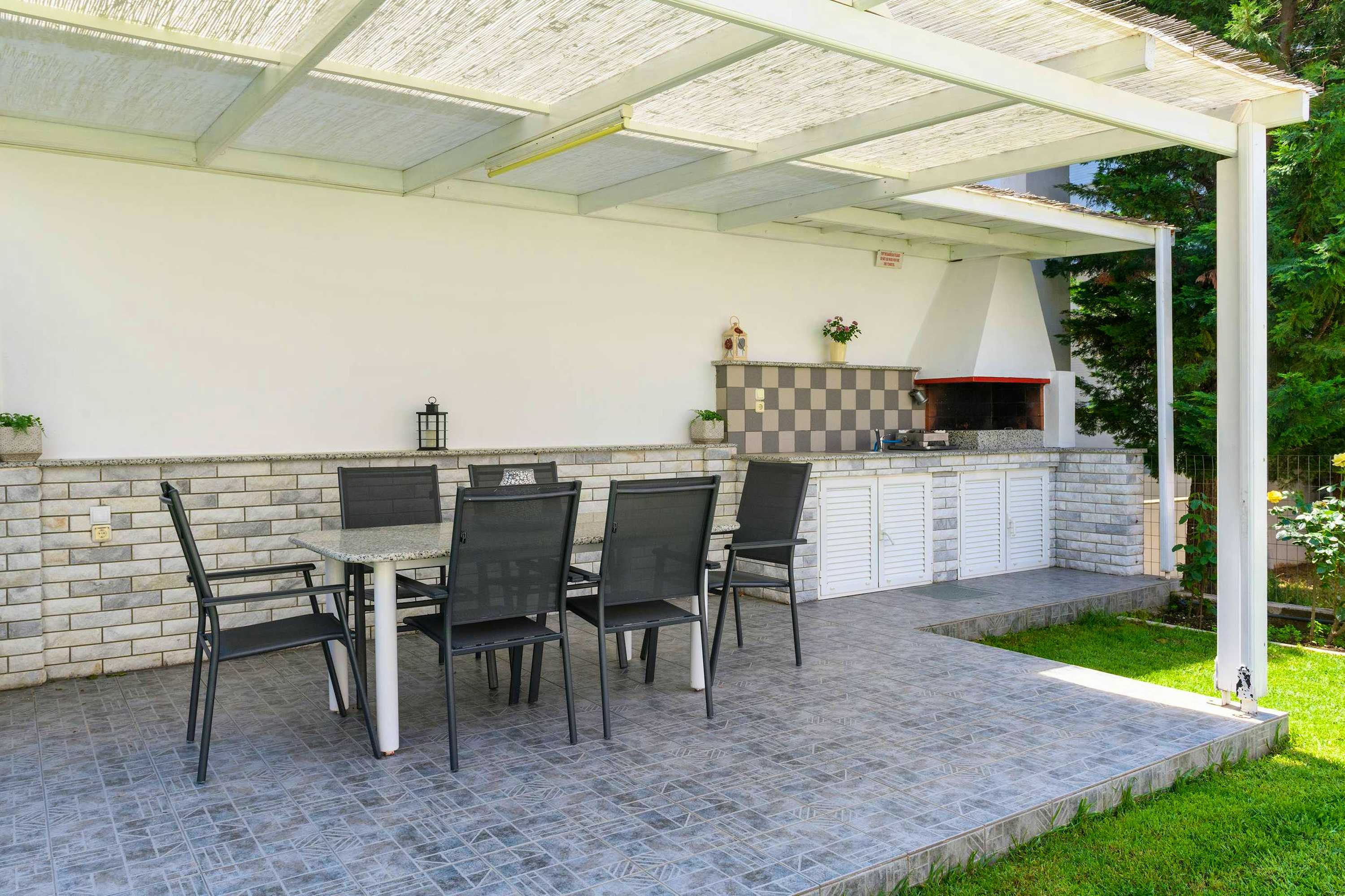 Photo Caption: BBQ Area Have a Cookout Gather with your family &